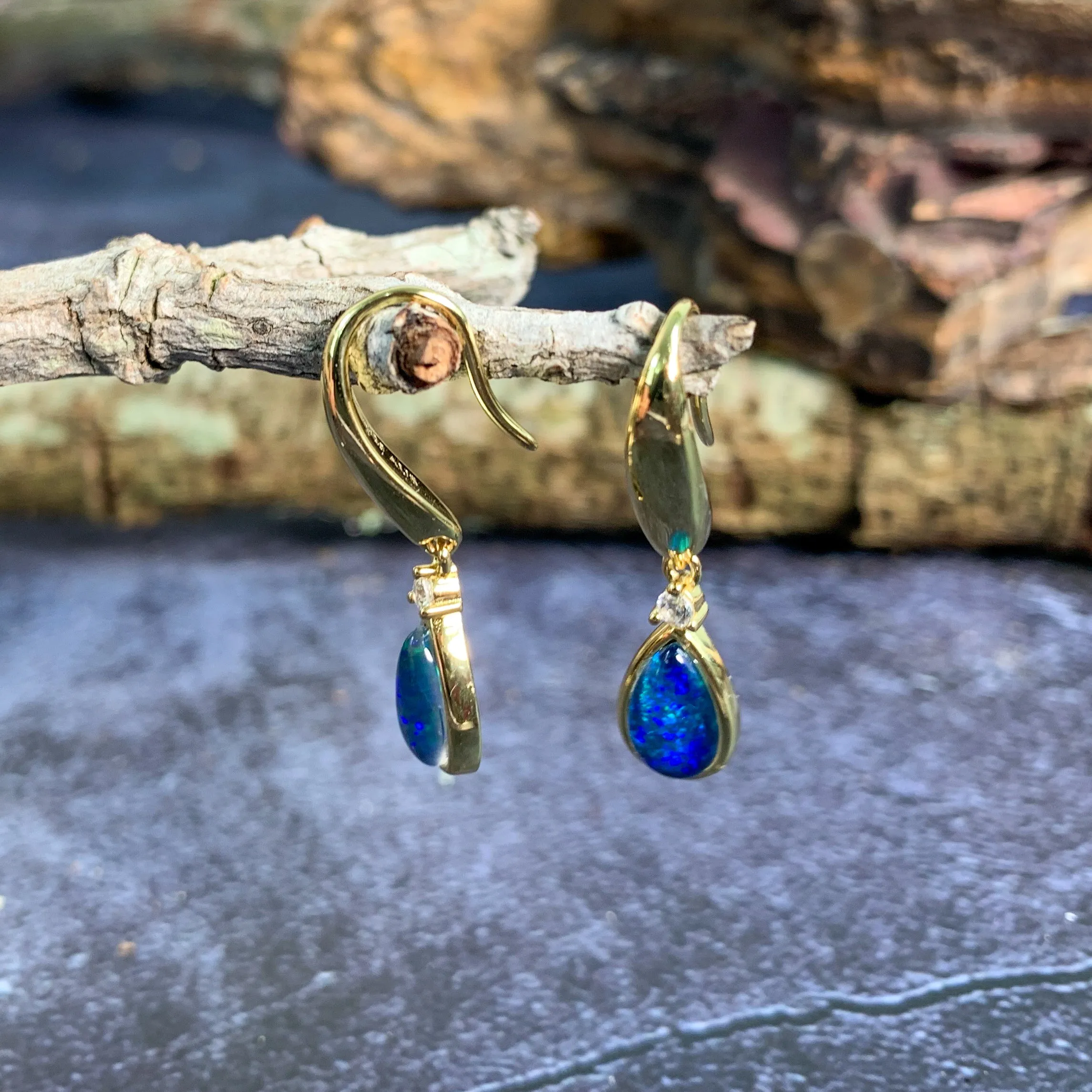 Gold plated silver dangling pearshape 8x5mm opal triplet earrings